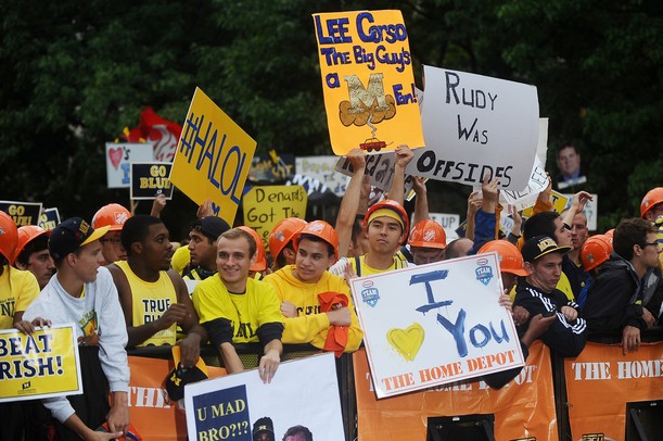 Michigan fans cheer and hold signs during a live broadcast of ESPN Game Day at Ingalls Mall on Saturday morning. Melanie Maxwell I AnnArbor.com